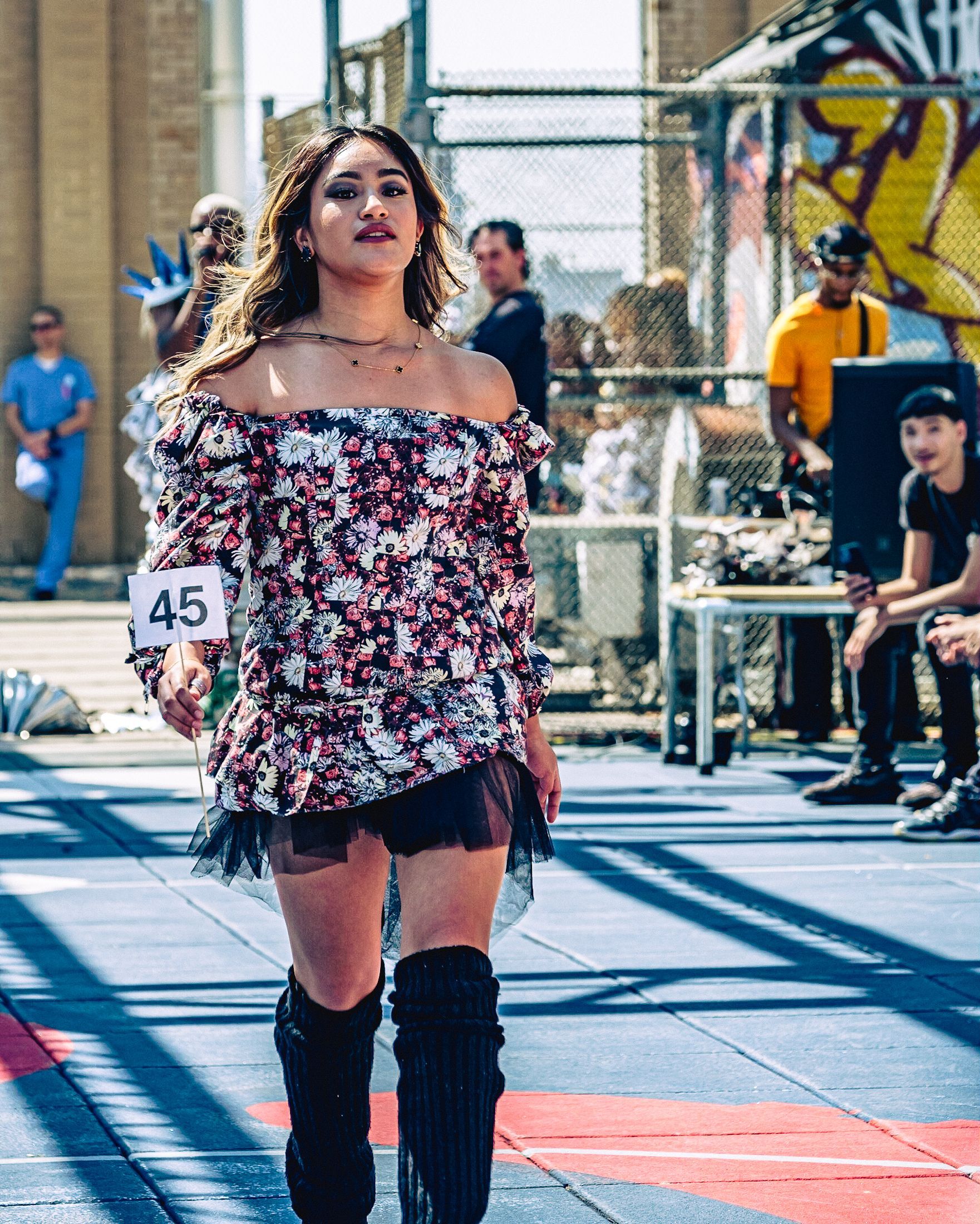 Model in hand-made garment at the 2023 Sustainable Fashion Show at New Design High School. Photo by Luis Suarez