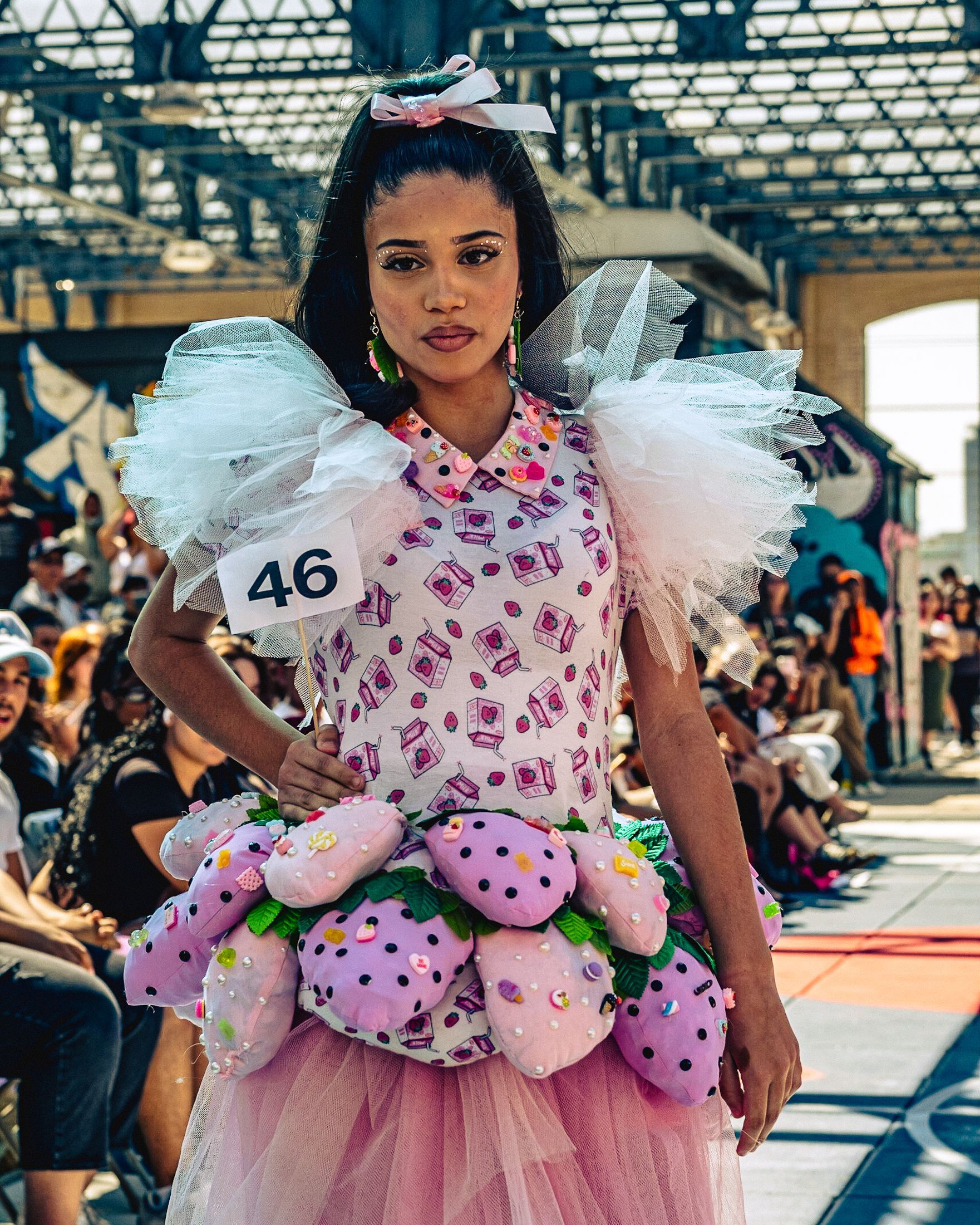 Model in hand-made garment at the 2023 Sustainable Fashion Show at New Design High School. Photo by Luis Suarez