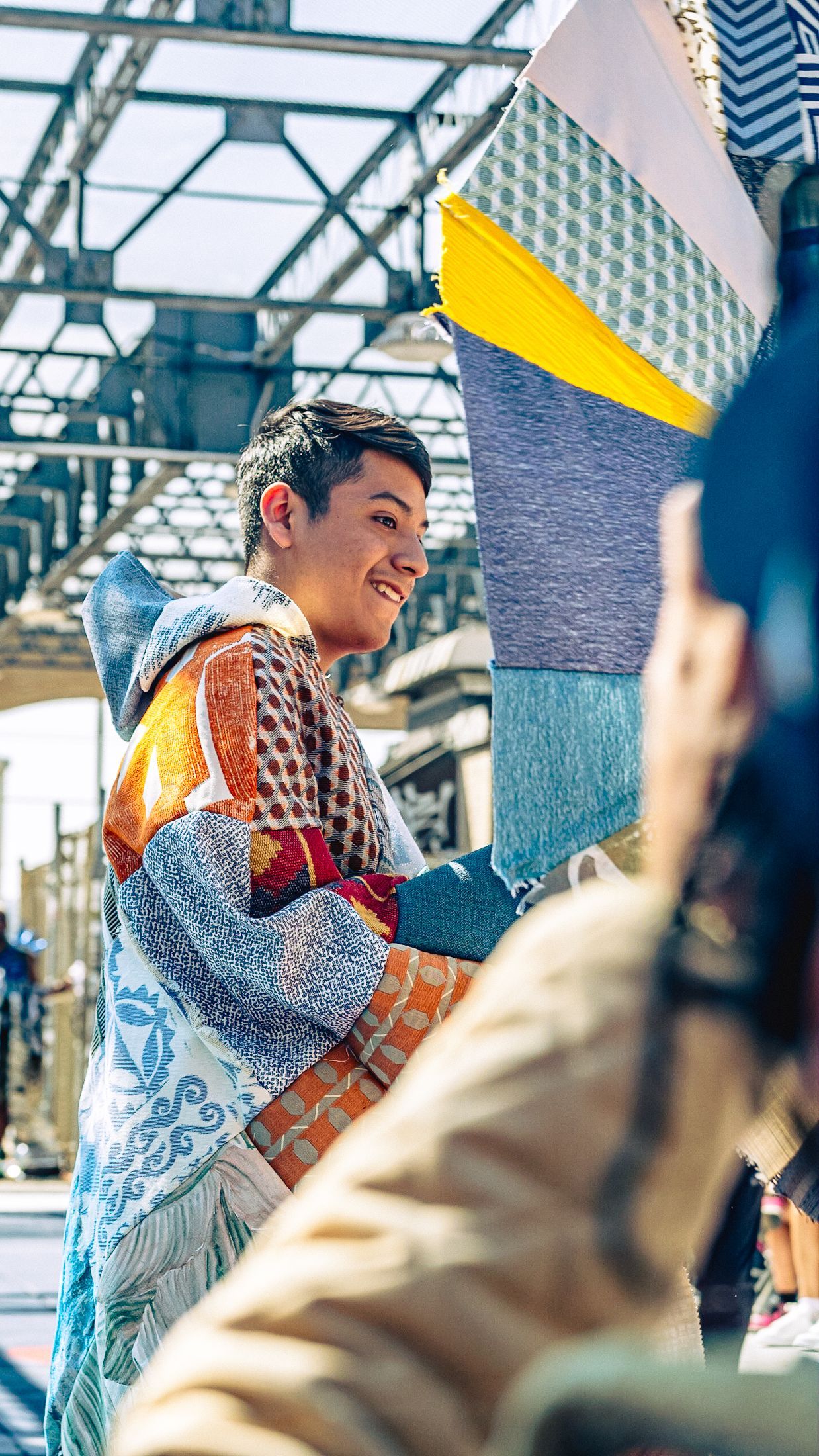 Model in hand-made garment at the 2023 Sustainable Fashion Show at New Design High School. Photo by Luis Suarez