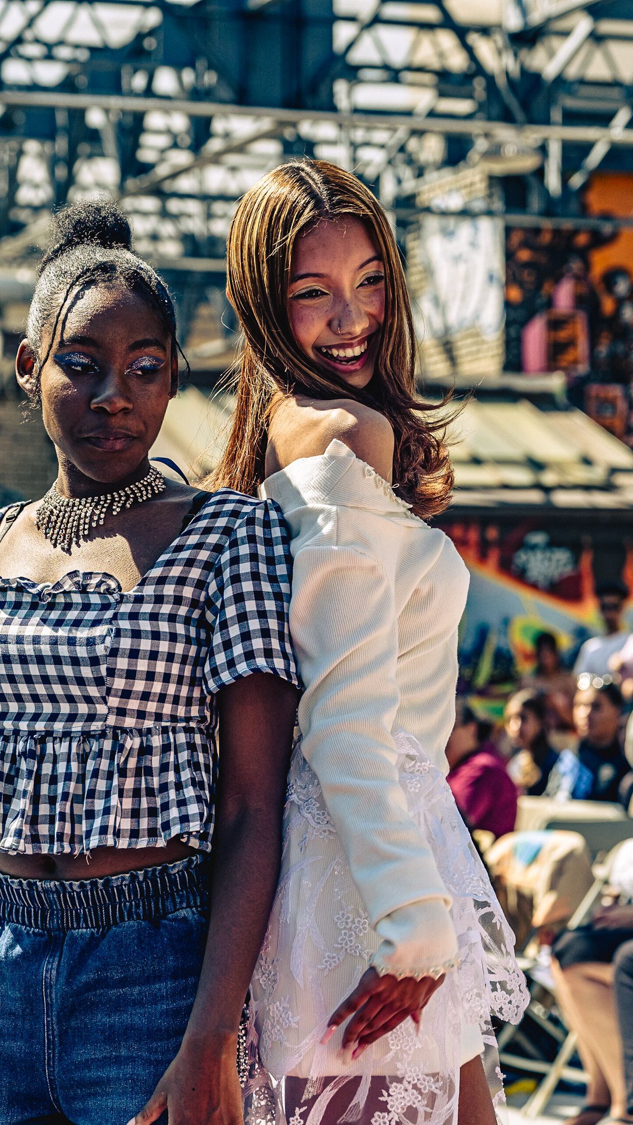 Model in hand-made garment at the 2023 Sustainable Fashion Show at New Design High School. Photo by Luis Suarez