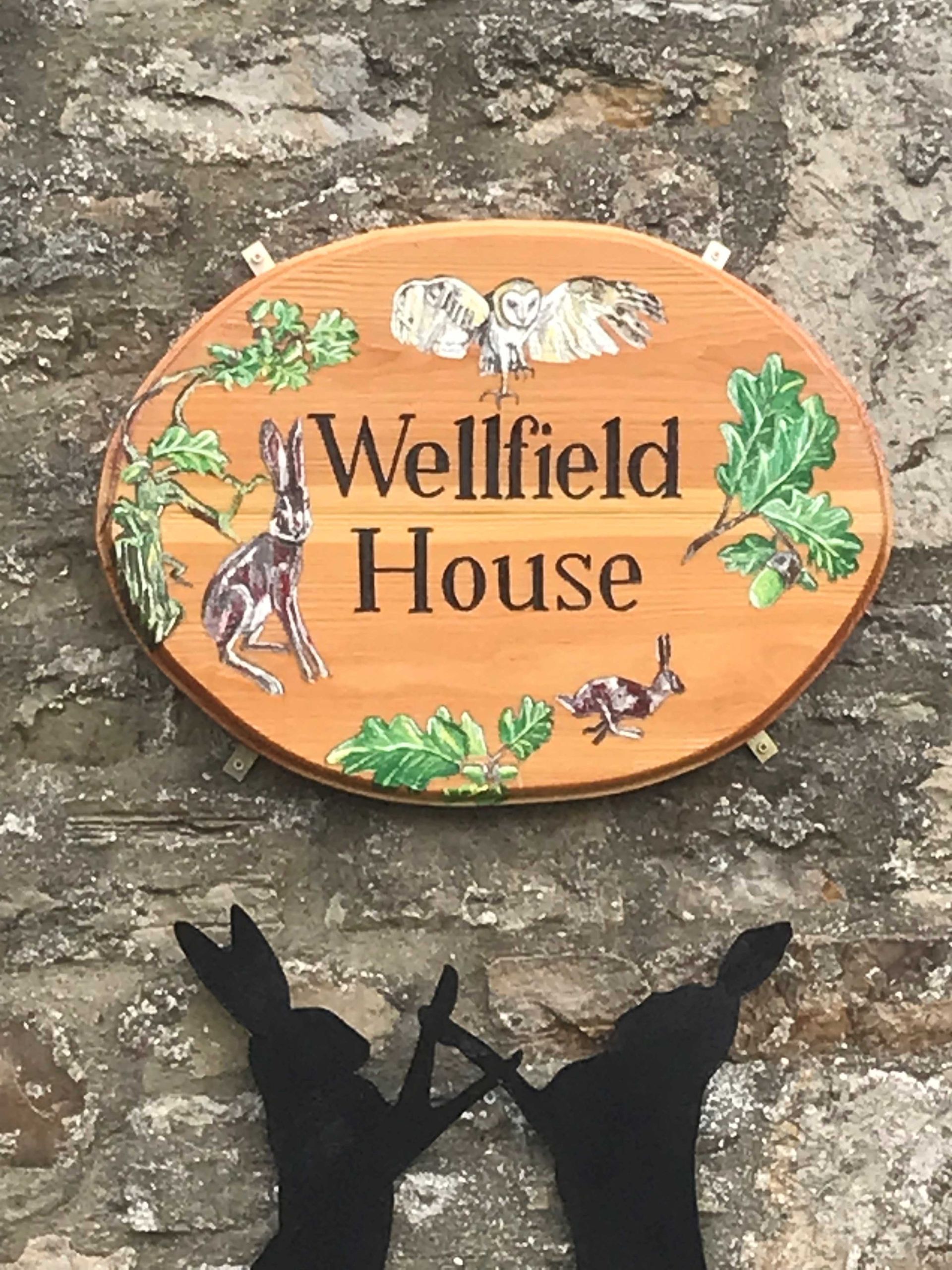 An illustrated rural house sign made by Ingrained Culture.