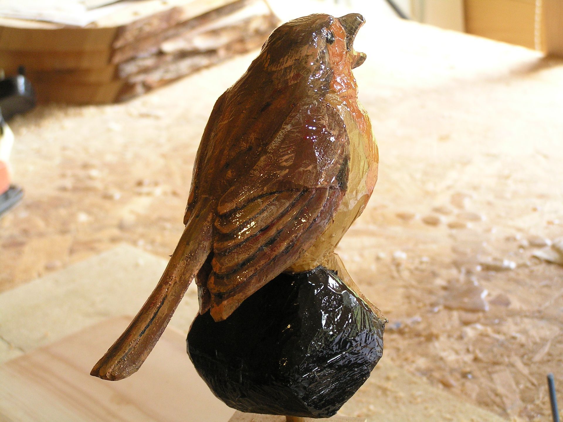 A hand carved Robin used for a private garden memorial and made by Ingrained Culture