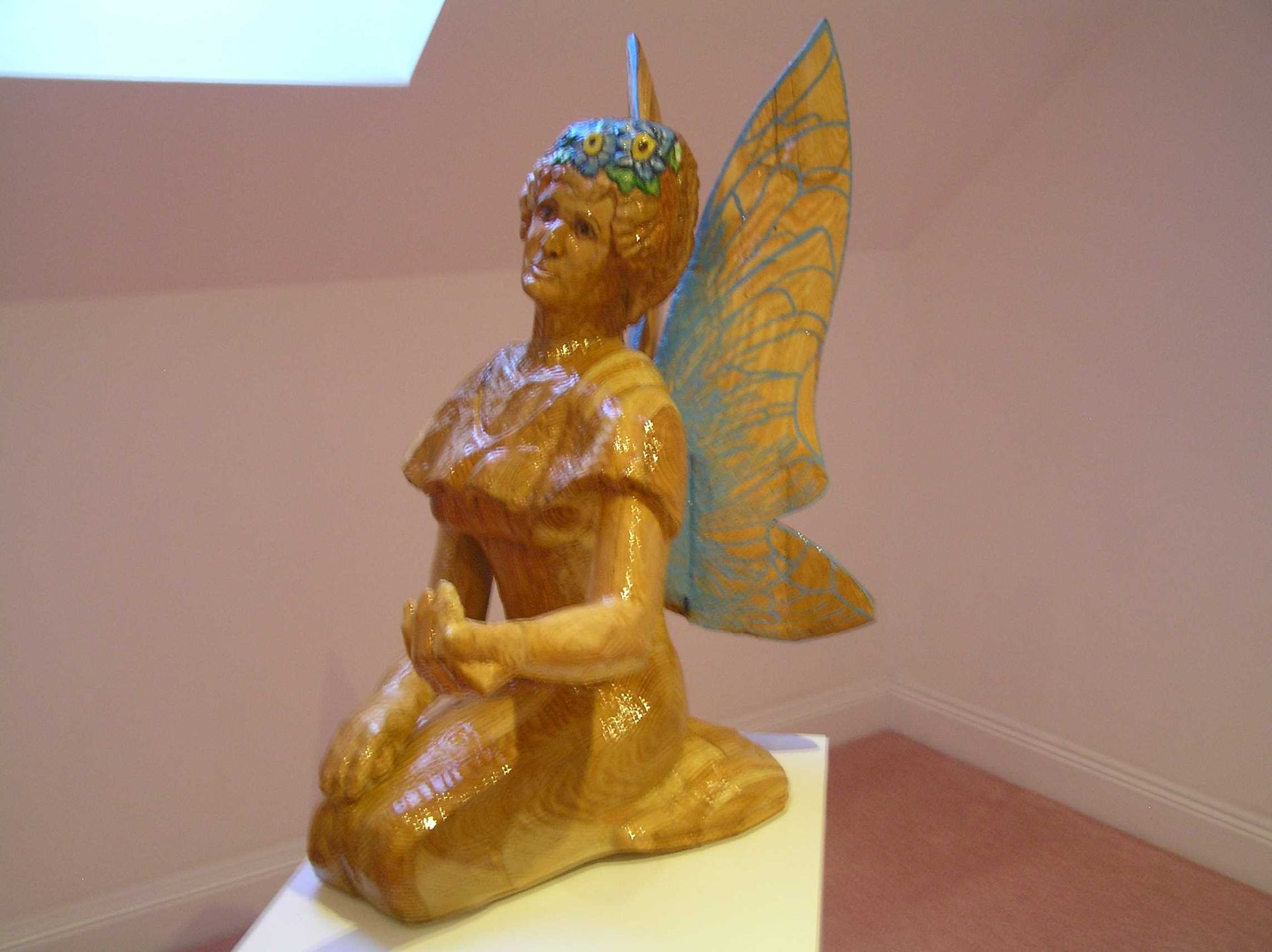 A garden sculpture of a fairy made by Ingrained Culture