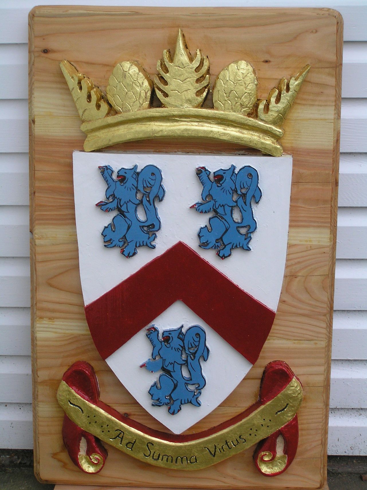 Hand crafted and gilded coat of arms made by Ingrained Culture.