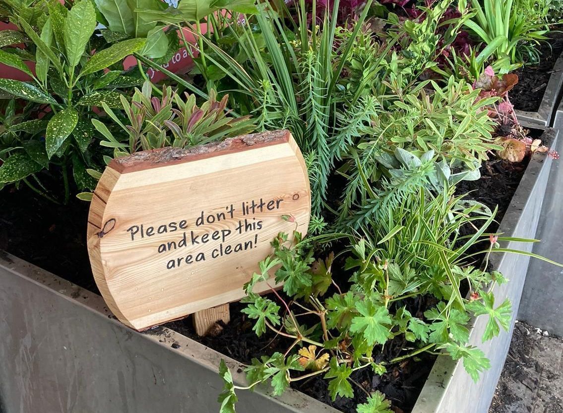 wooden anti litter sustainable sign