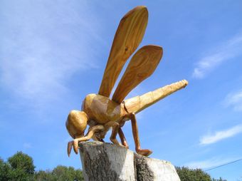 A sculpture of a dragonfly by Ingrained Culture