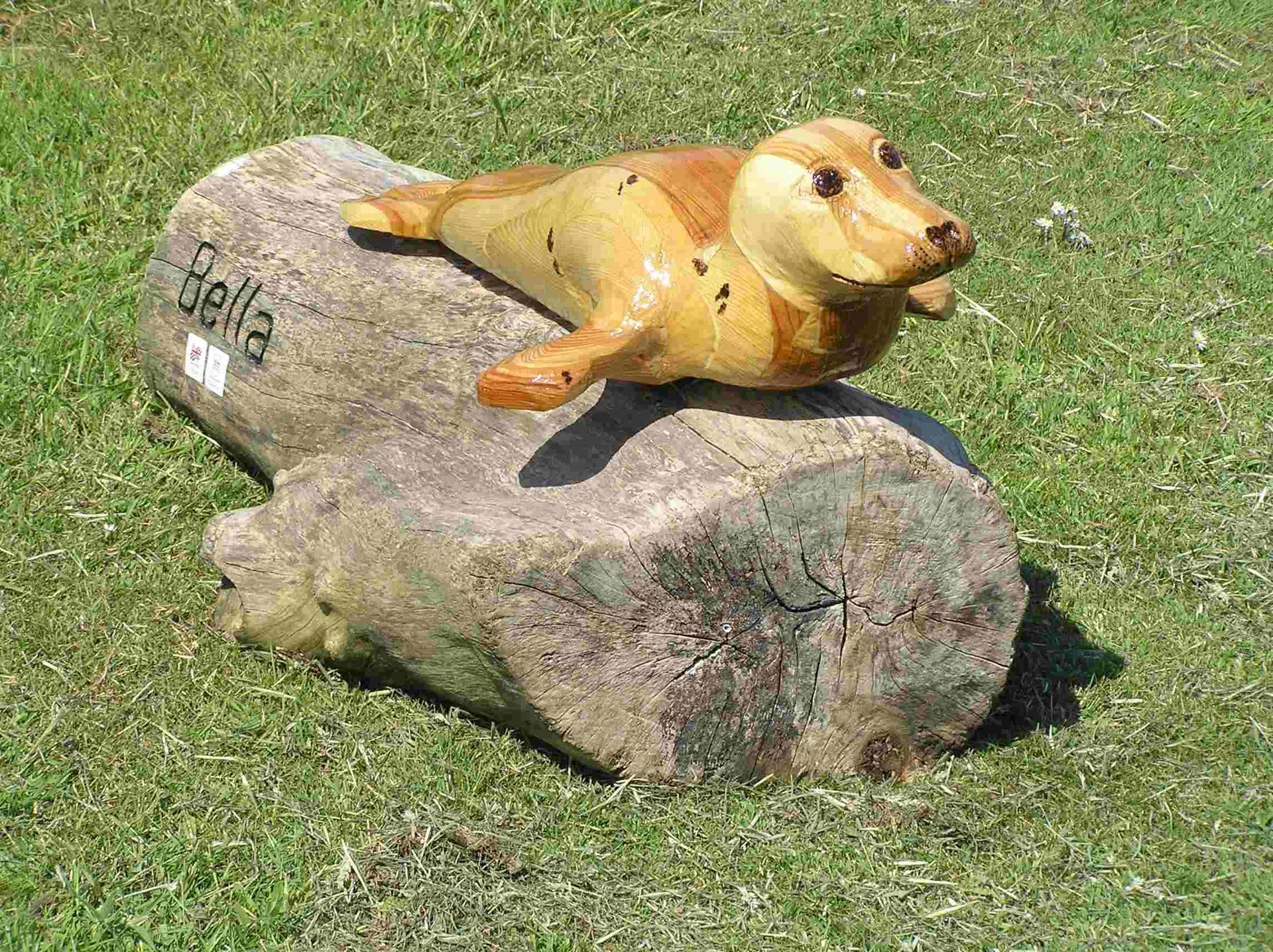 A garden sculpture of a seal pup made by Ingrained Culture