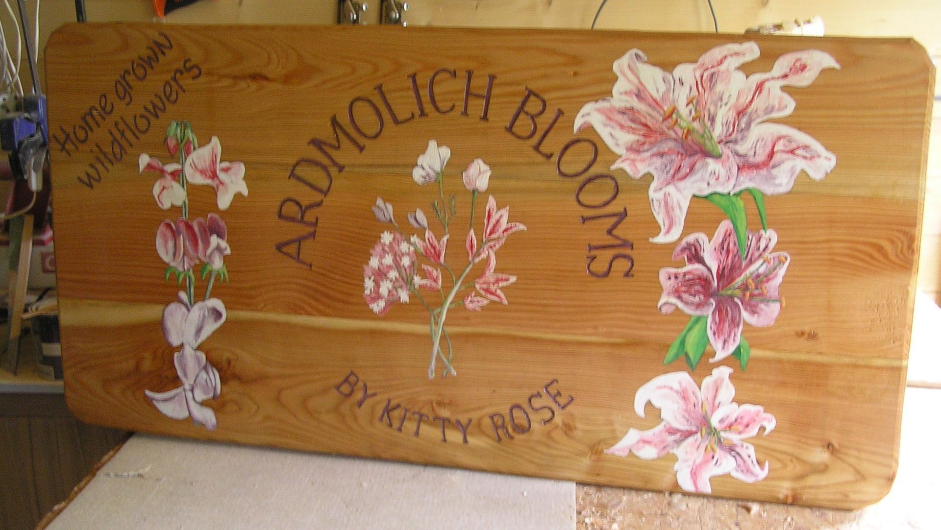 Hand painted business sign for a florist by Ingrained Culture 