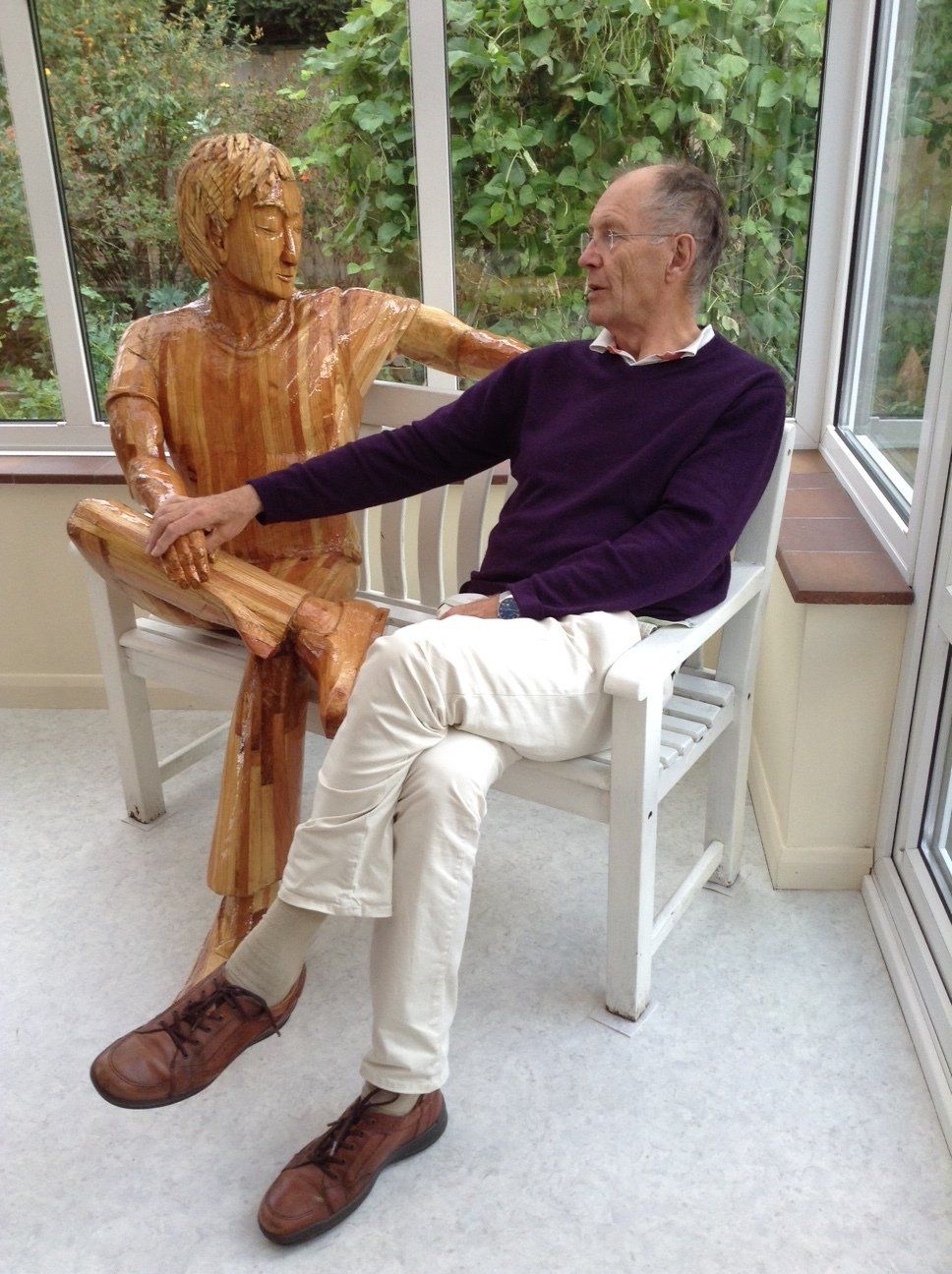 One man confiding to another.