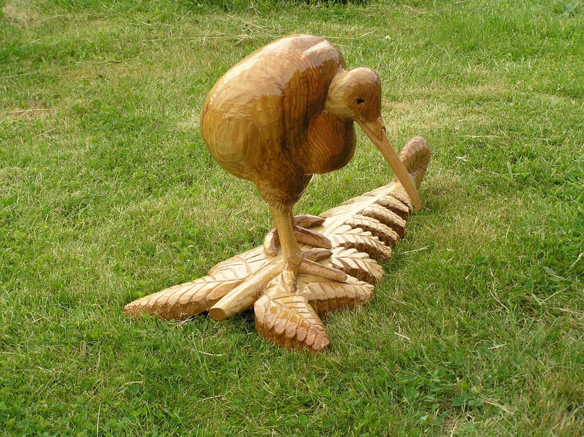 An individually designed Eco-friendly wooden sculpture of a kiwi bird made by Ingrained Culture