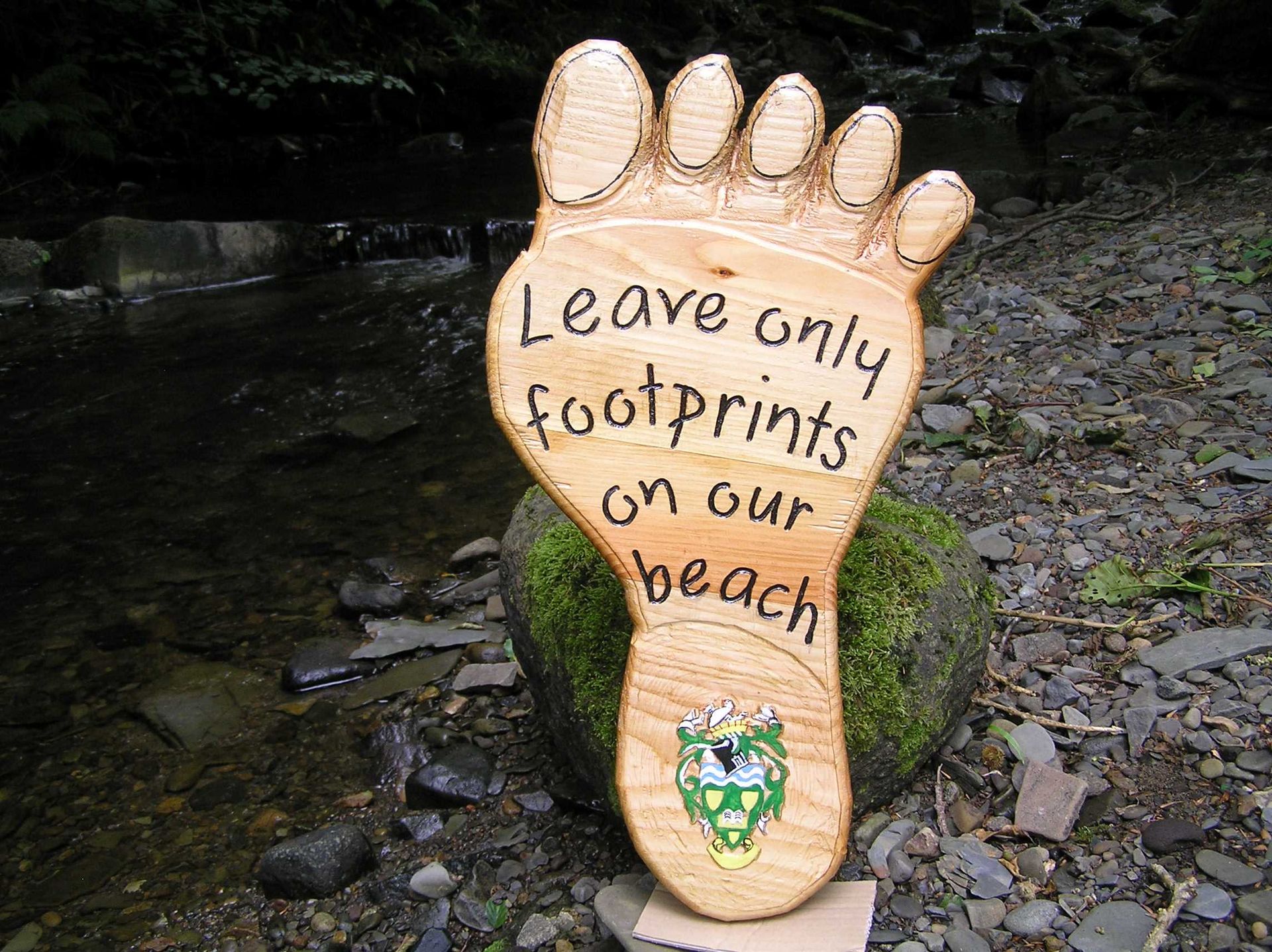 Anti litter wooden eco-sign by ingrained culture