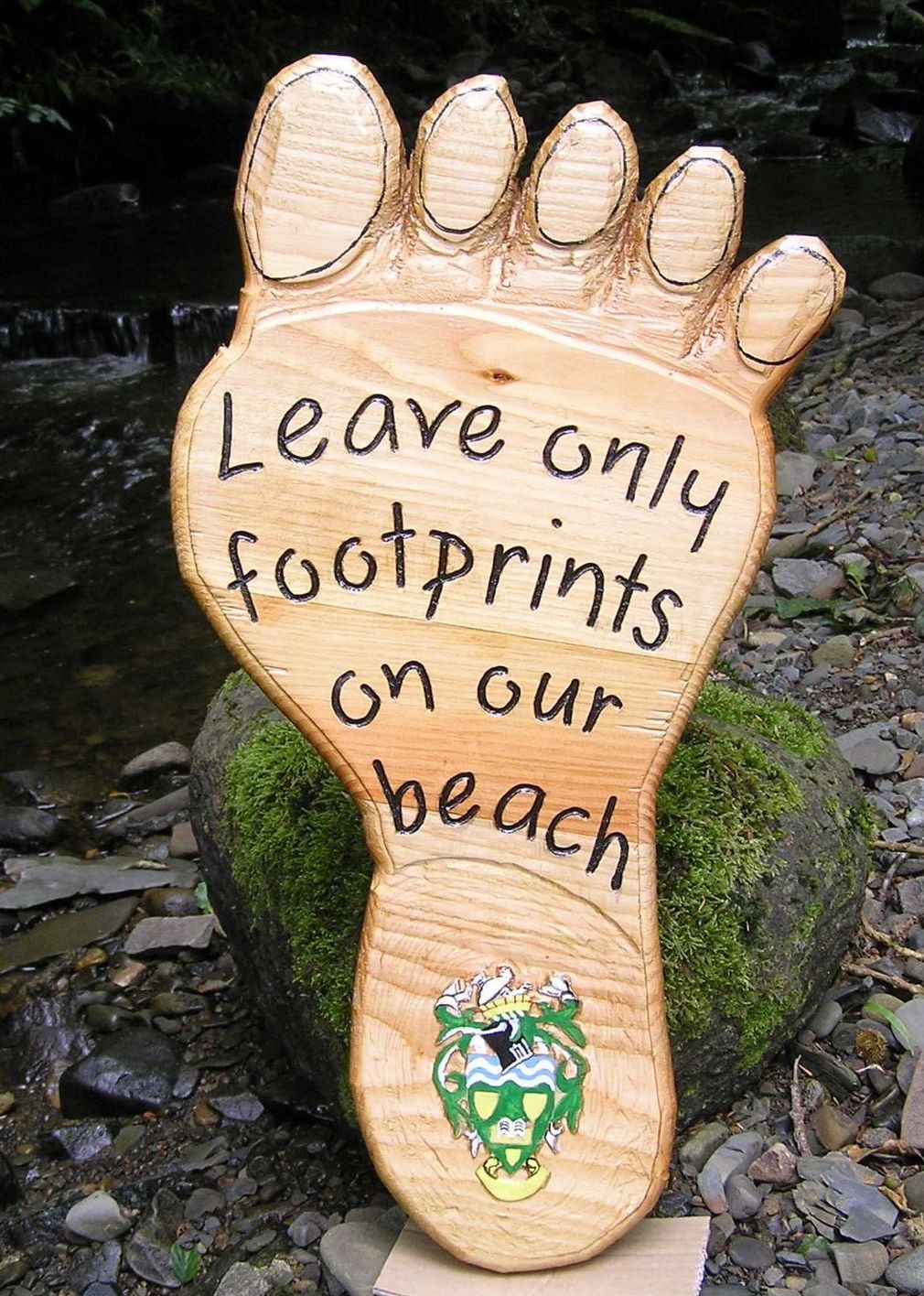 Wooden Eco-sign for an anti-litter campaign made by Ingrained Culture