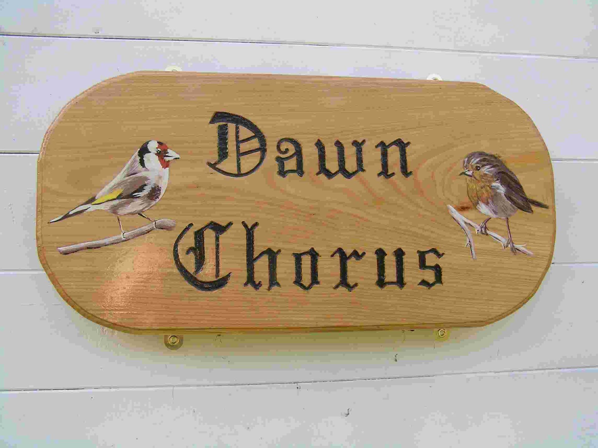 A wooden premium quality house name plaque with hand painted gold finch and robin made by Robert Ingrained Culture