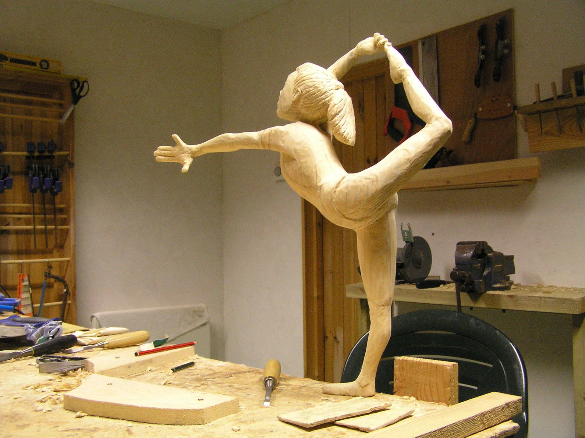 Gymnast wooden sculpture by Ingrained Culture.