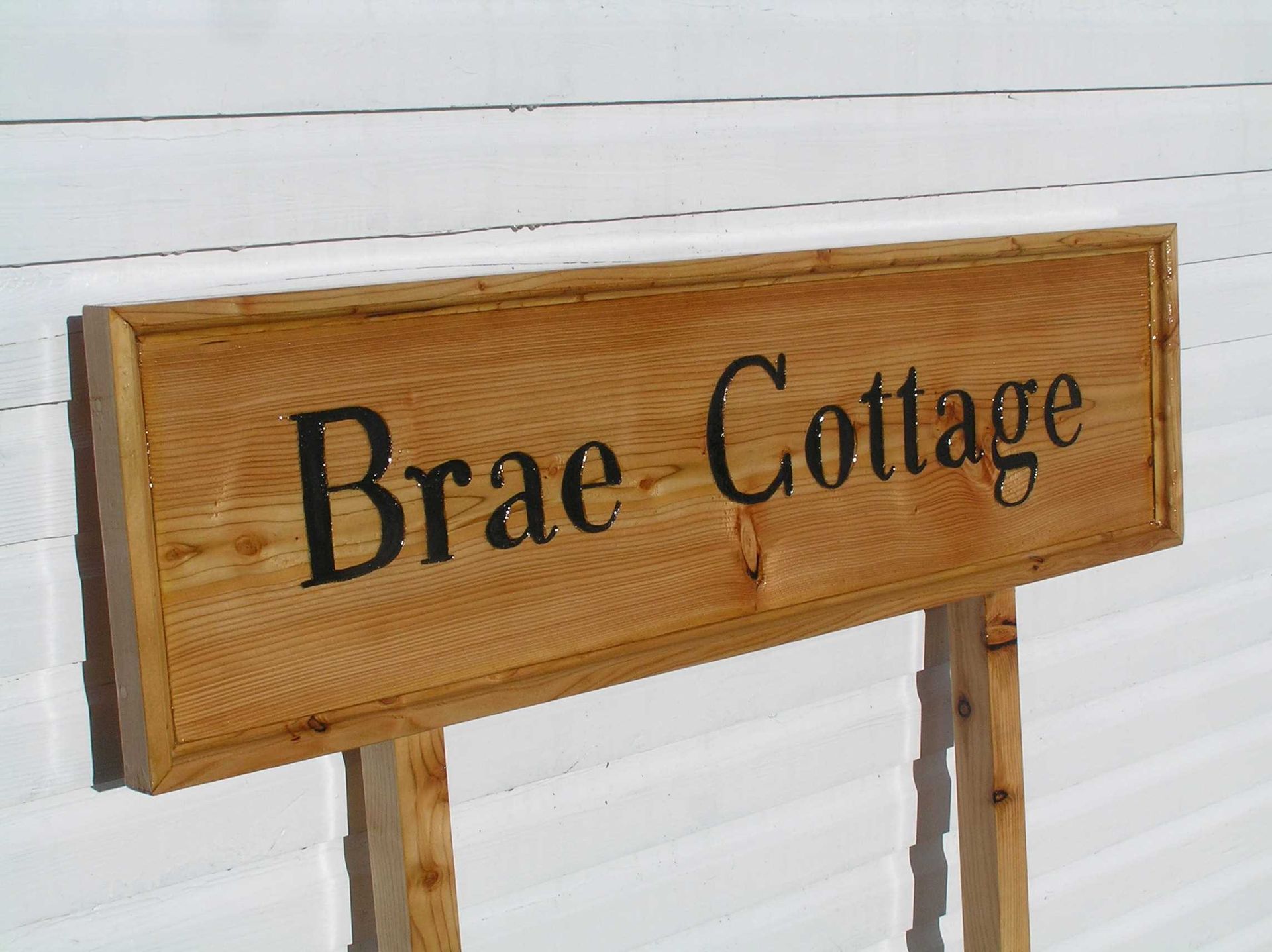 Traditional wooden house name sign by Ingrained Culture