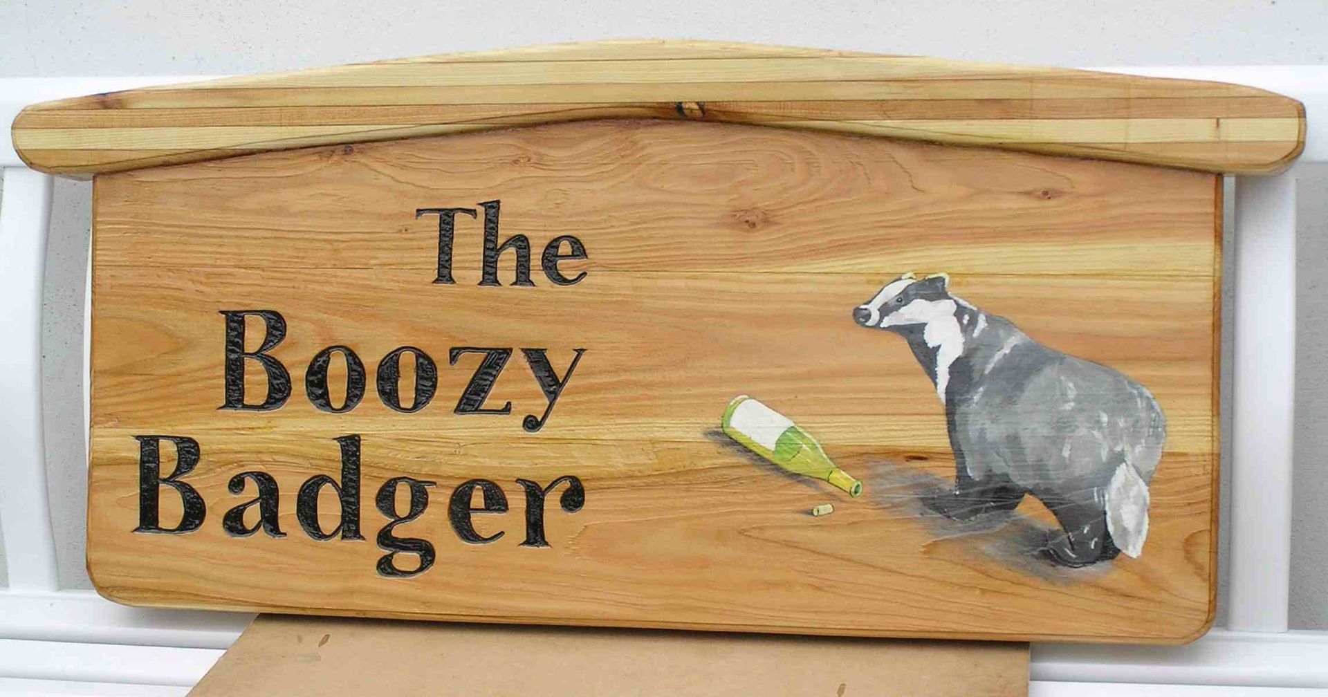 a wooden business sign, made from sustainable British grown wood by Ingrained Culture