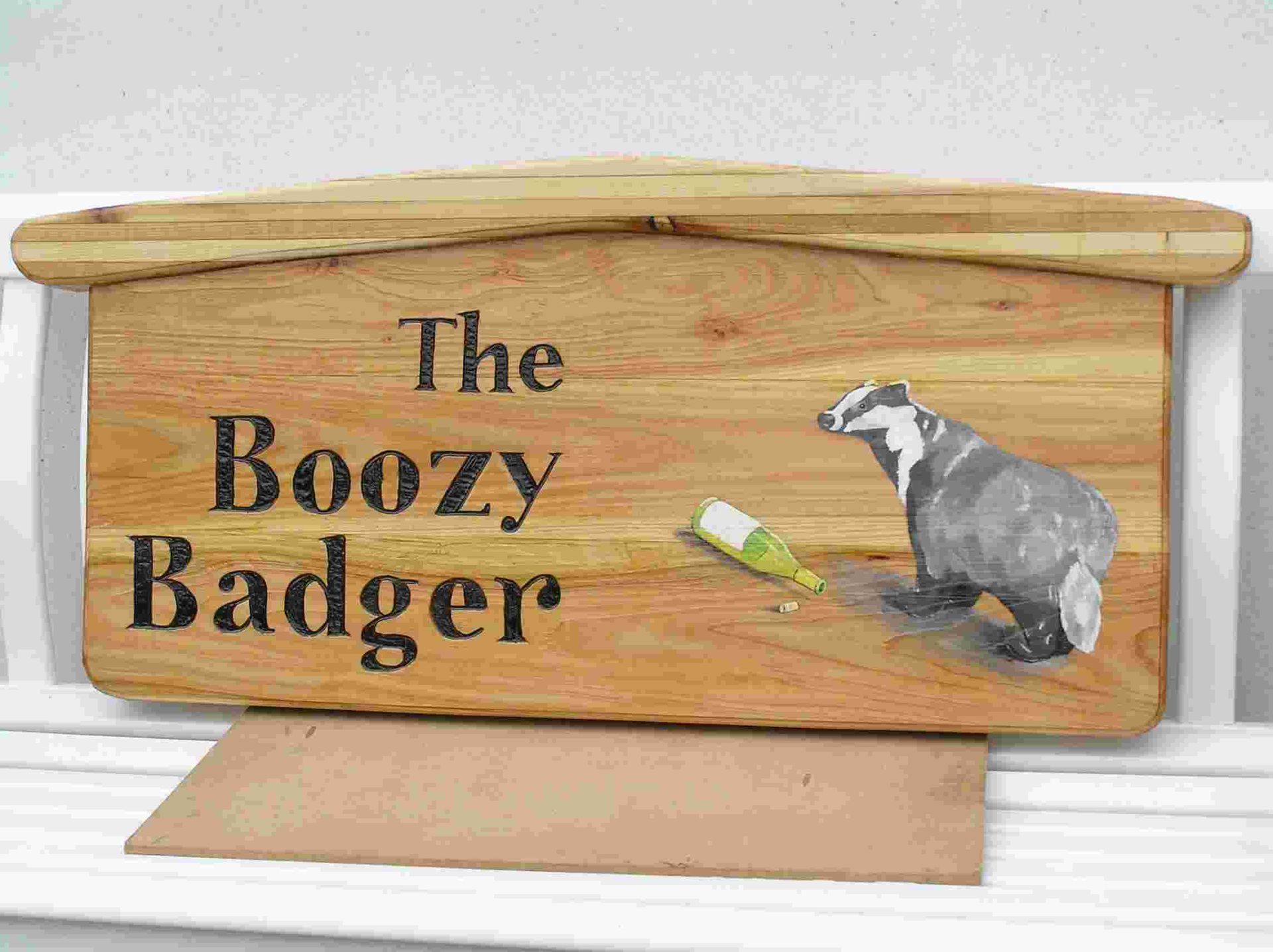 A  wooden business sign made from British wood by Ingrained Cultu