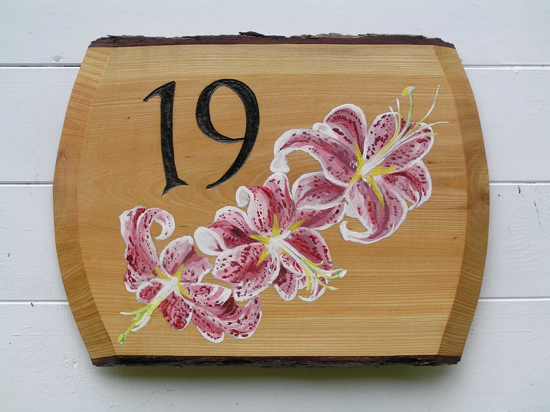 Modern illustrated wooden house number plaque made by Ingrained Culture