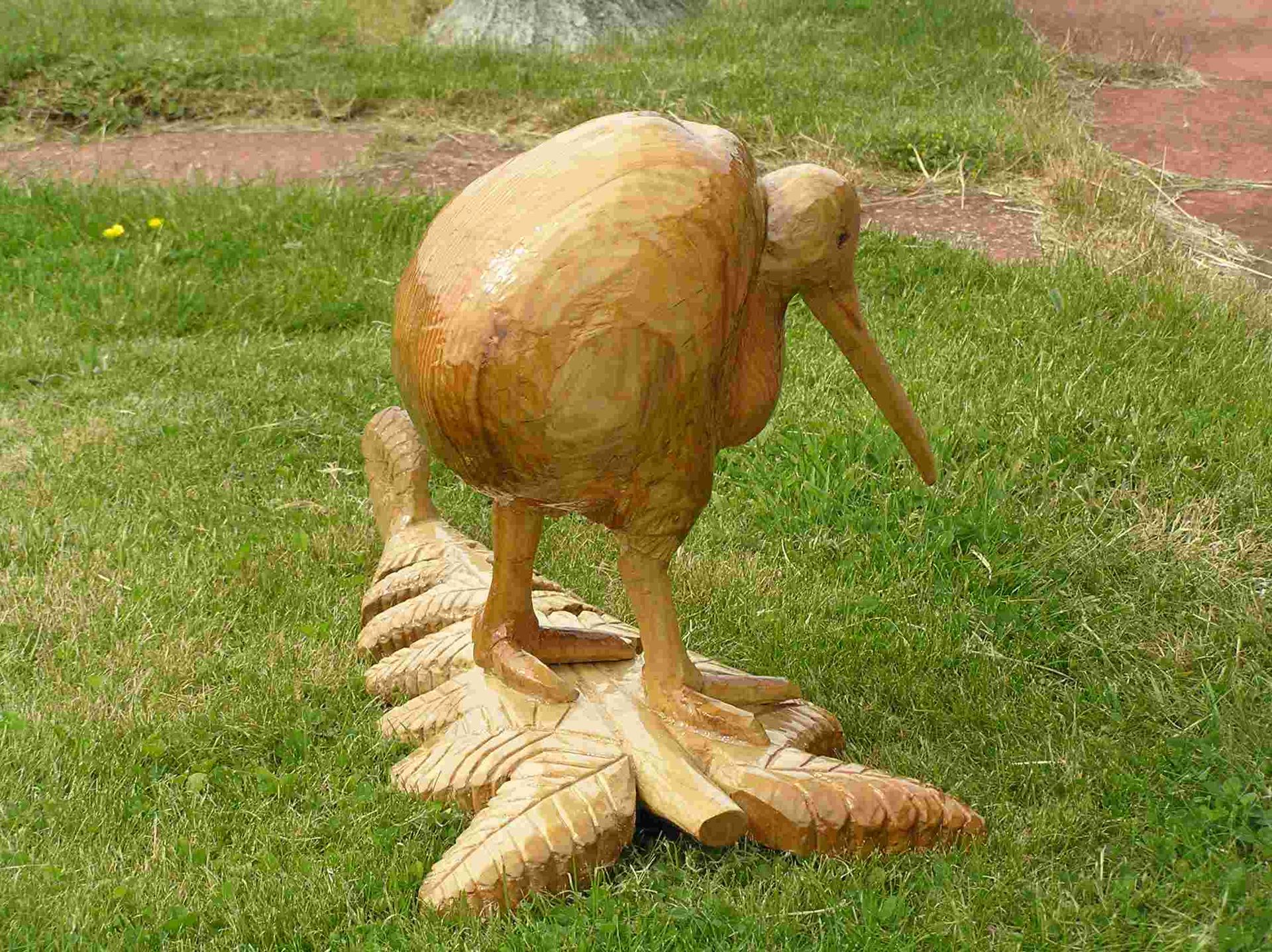 An individually designed Eco-friendly wooden sculpture of a kiwi bird made by Ingrained Culture