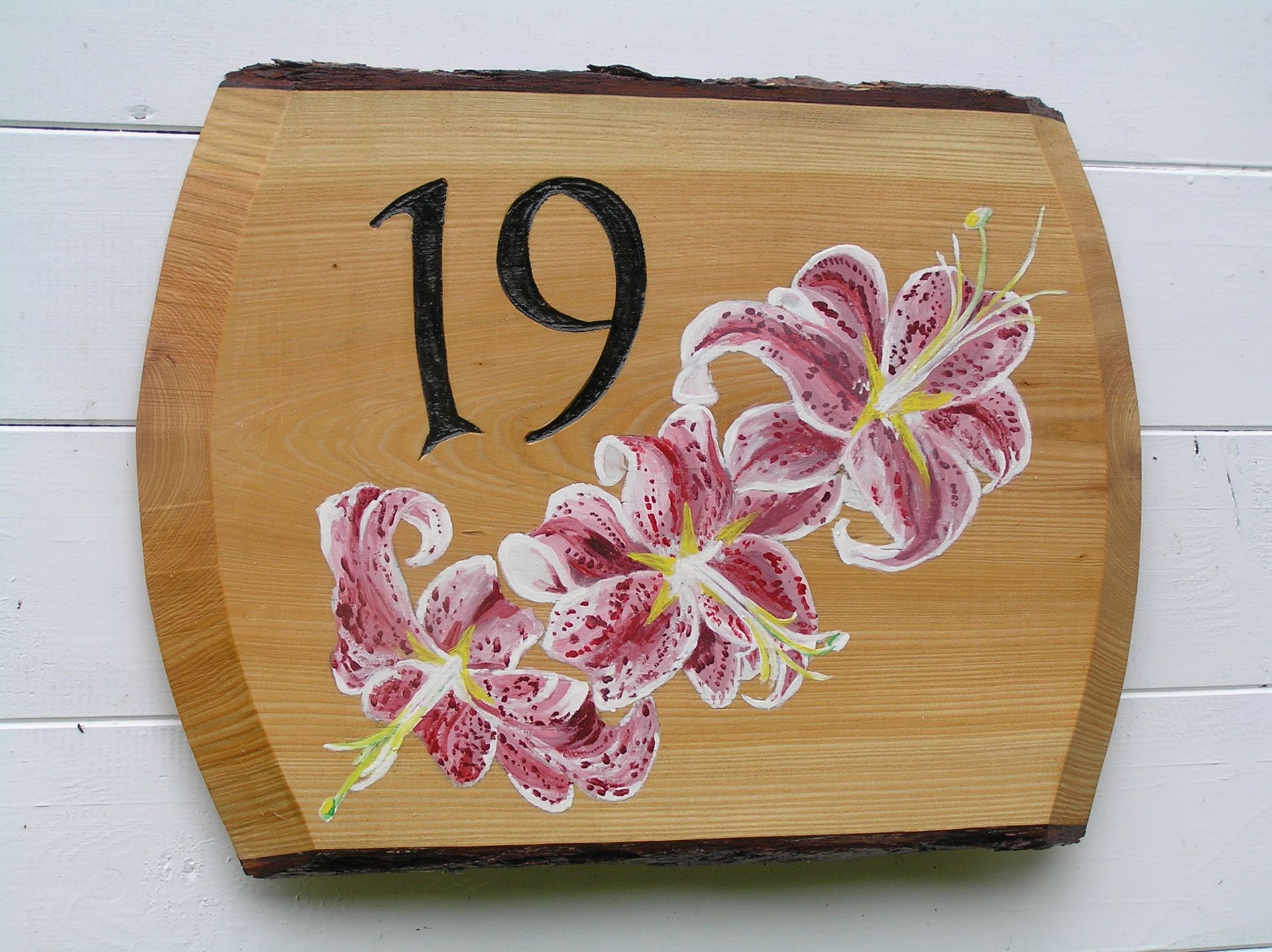 Modern illustrated wooden house number plaque made by Ingrained Culture