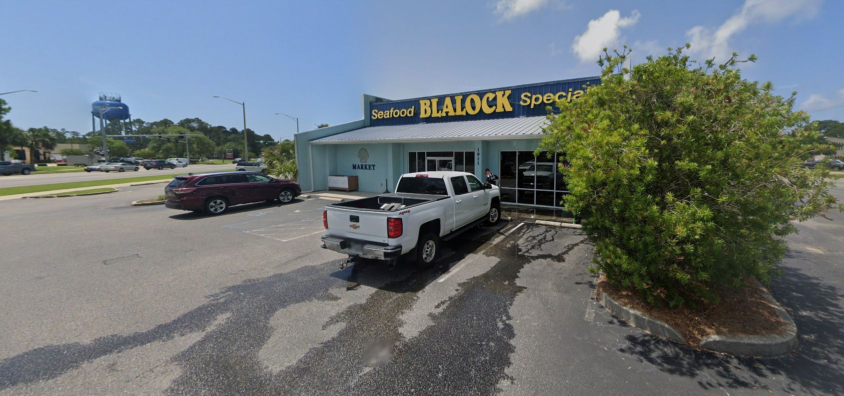 Blalock Seafood & Specialty Market - exterior view with car parked