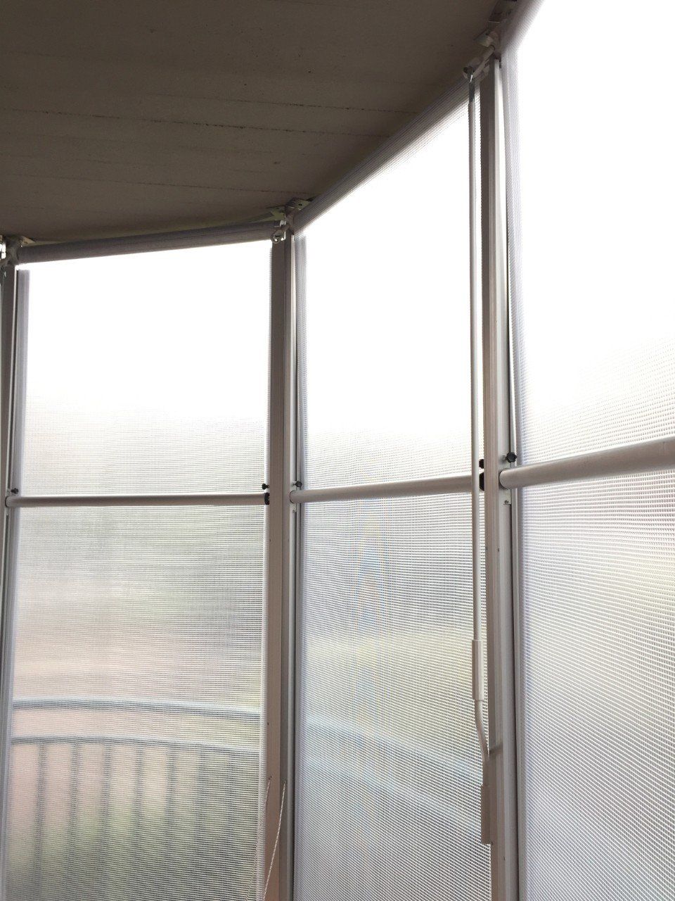 Parete con tende invernali a Torino di colore trasparente