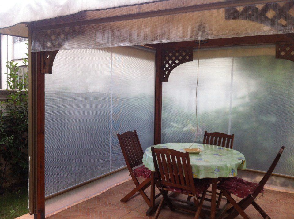 Tende invernali a Torino trasparenti su veranda esterna