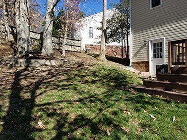 Before image of a high ground yard — Richmond, VA — Land Designs LLC