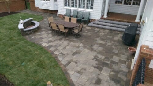 Custom patio with stone steps and fire pit — Richmond, VA — Land Designs LLC