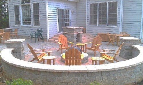 Patio with sitting wall and fire pit — Richmond, VA — Land Designs LLC