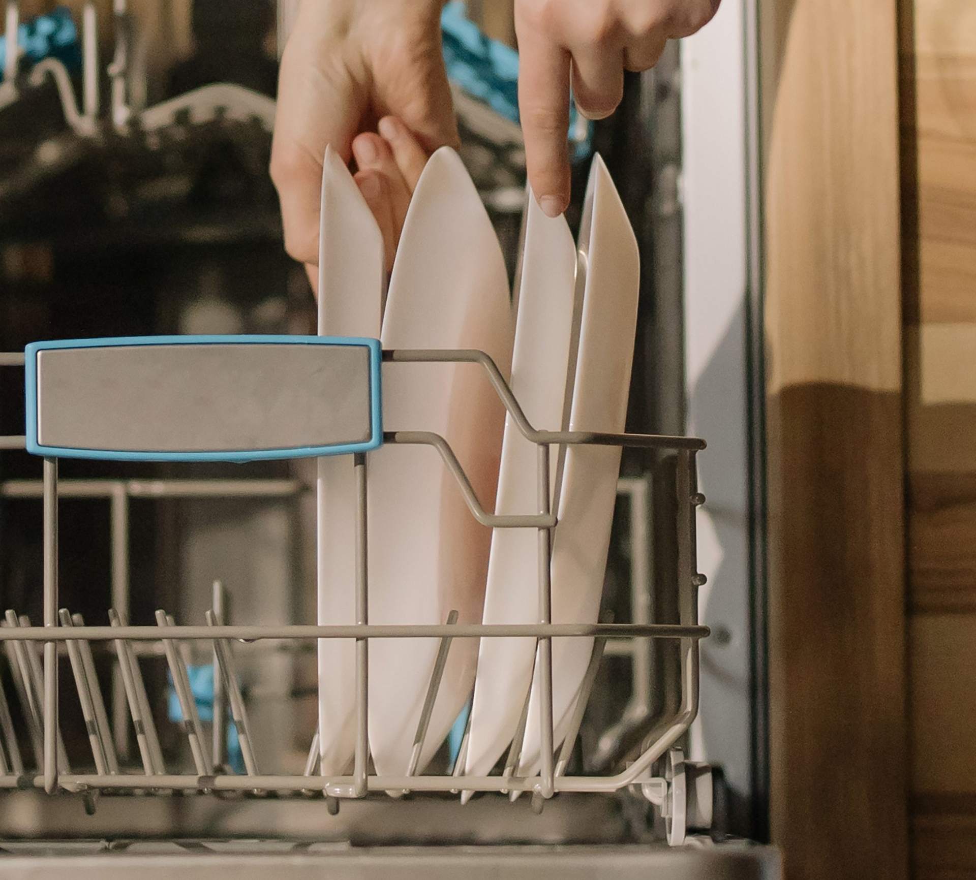 putting dishes in a dishwasher
