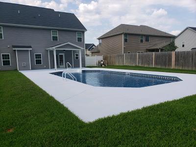 pool with wooden fence surrounding3