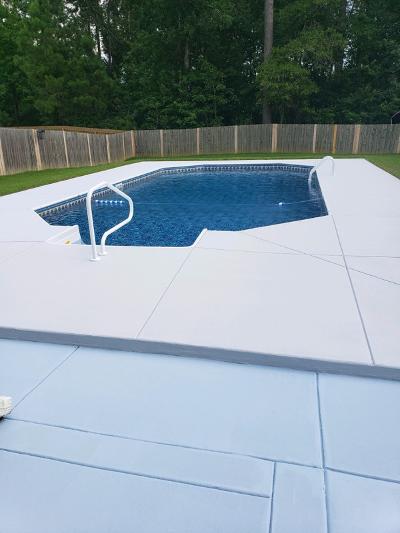 pool with wooden fence surrounding4