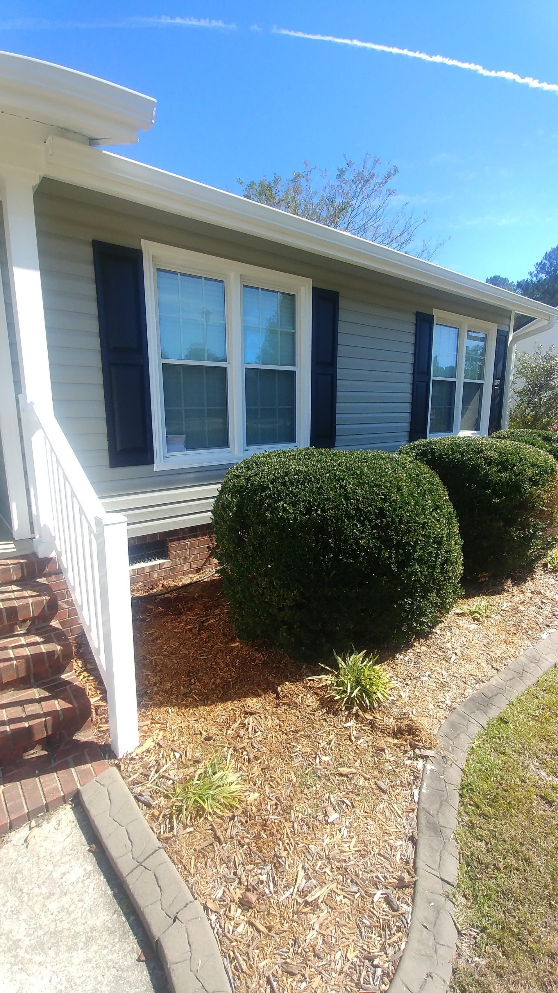 window replacements on ranch style house