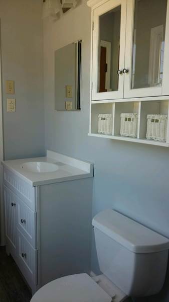 Single Vanity and White Cabinetry | Bathroom Remodel | Fayetteville, NC