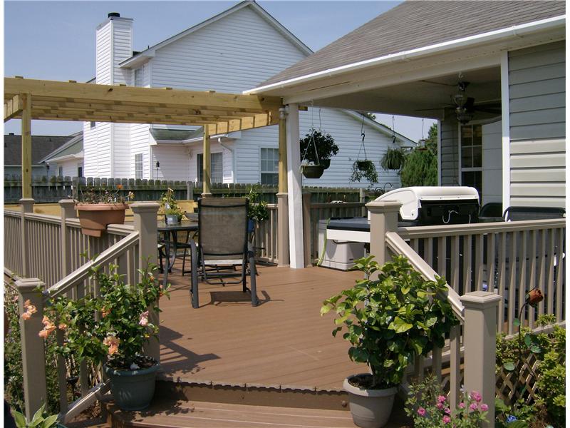 deck off of covered porch with pergola attached