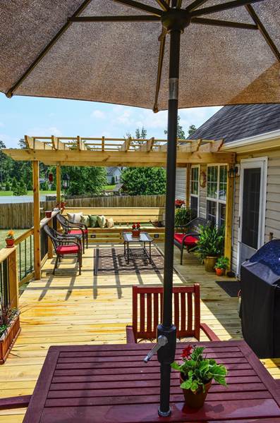 new deck on back of house with pergola