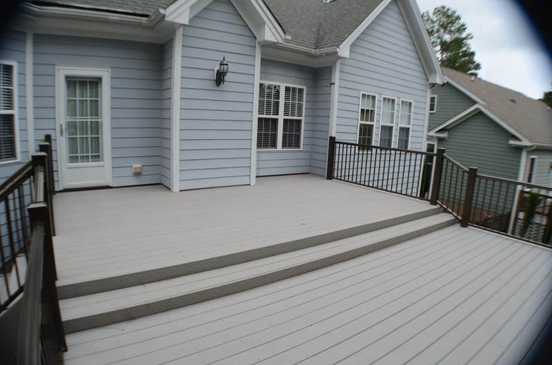 new gray deck that steps down to a lower deck portion