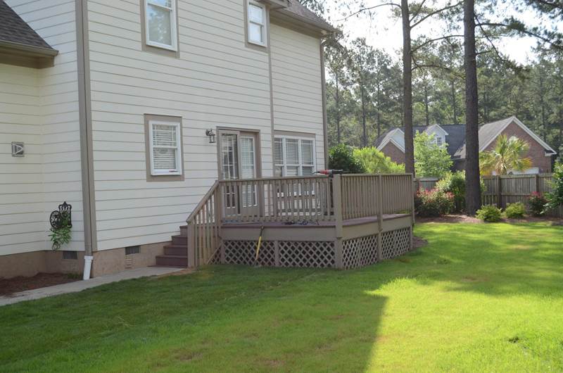 deck on back of house with lattice on bottom