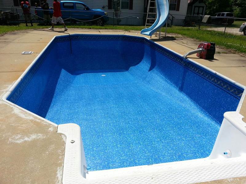 inground pool being filled after repair