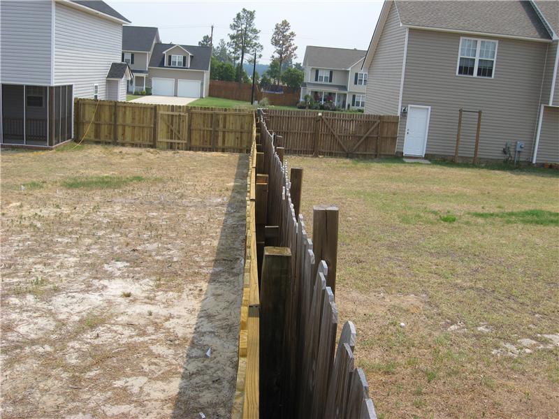 aerial view of space between neighboring fences