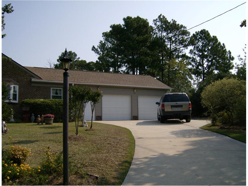 garage addition with 2 single car garage doors