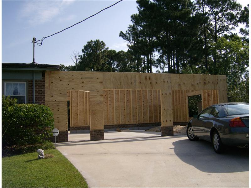 garage under construction for 2 single car garage entries