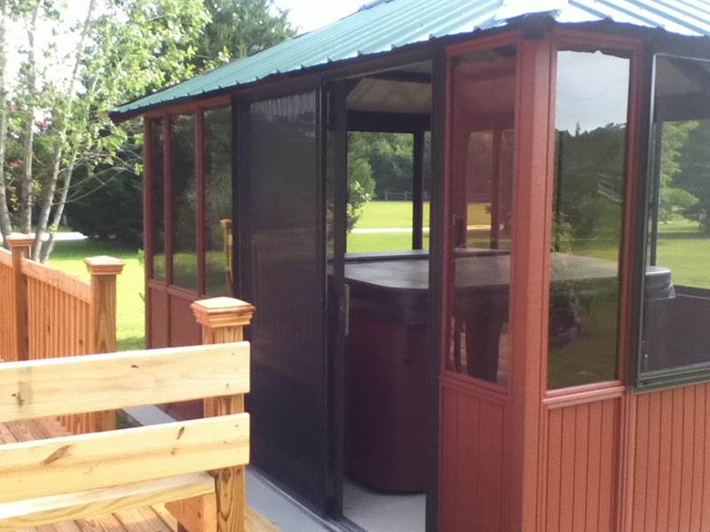 hot tub inside screened gazebo