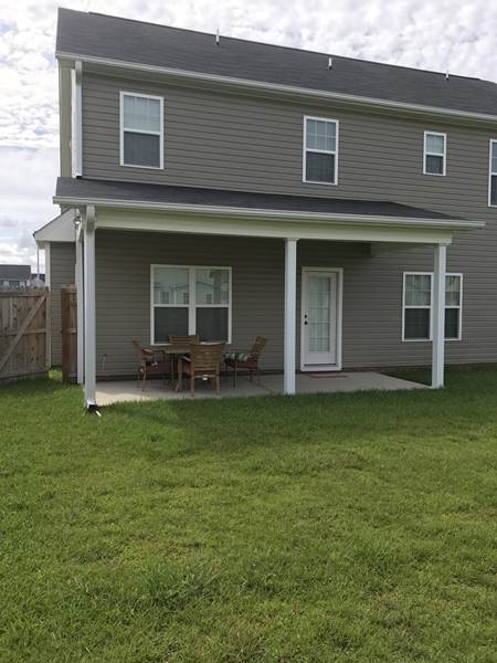 covered patio on back of house