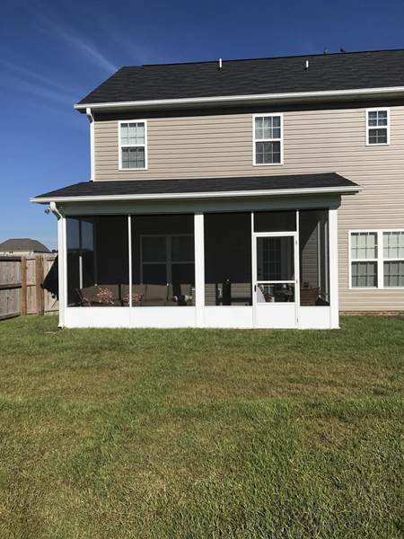 screened porch on back of house