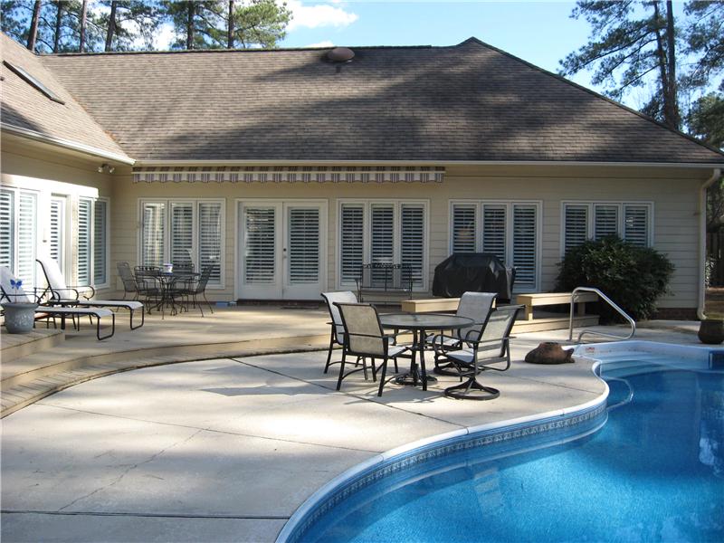 patio on side of inground pool