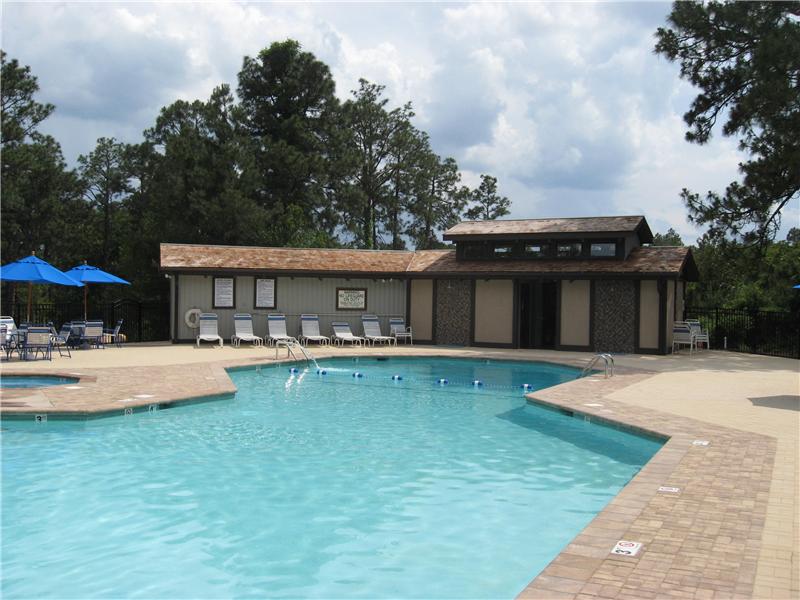 inground pool with brick surround