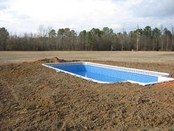 Dirt and Soil Filled in Around Pool Frame | Pool Builder | Fayetteville, NC