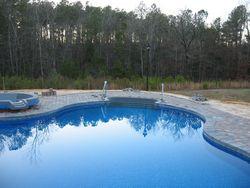 Bricks Layed around Perimeter of Swimming Pool  | Swimming Pool Contractor | Fayetteville, NC